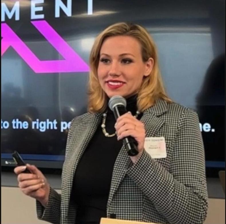 SalesPlay X team member speaking at a conference